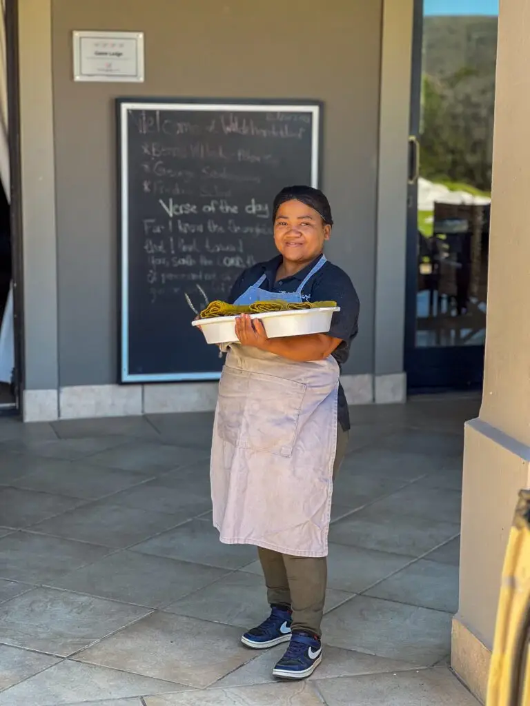 Elizabeth of Wildehondekloof Lodge. Handing cold washcloths upon our return from a game drive
