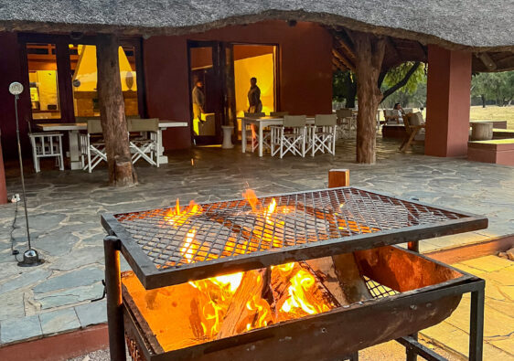A big fire on a braai in a game lodge in South Africa for Heritage Day