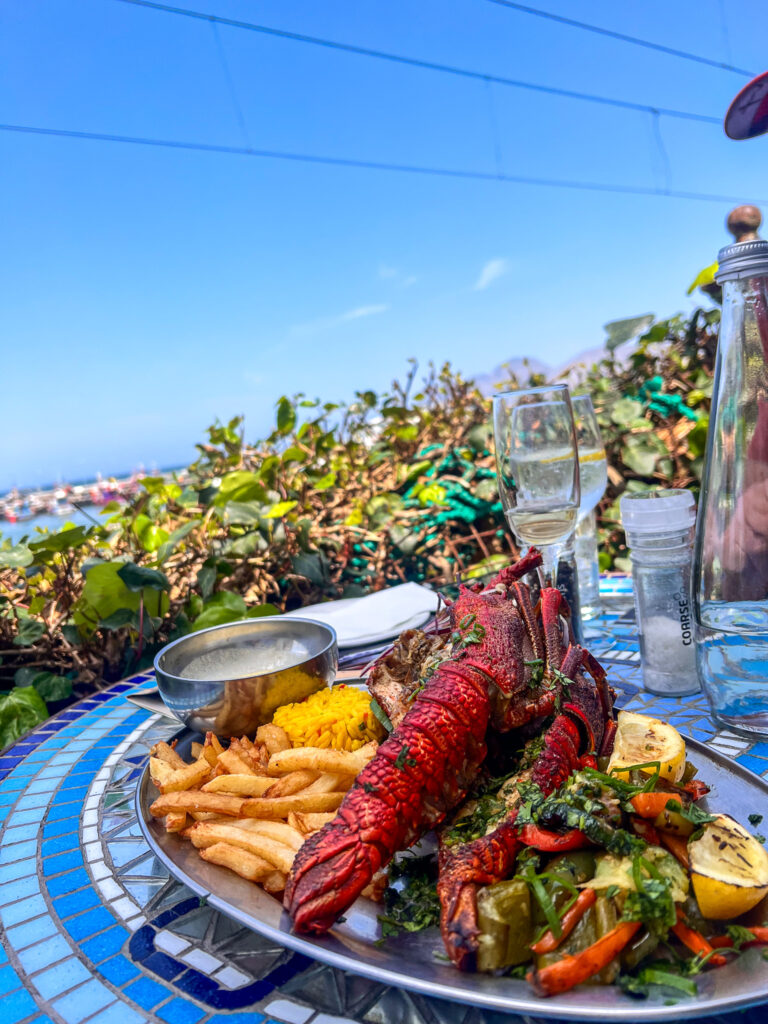 Crayfish on a place at a restaurant on the railway lines in Kalk Bay - Cape To Cuba