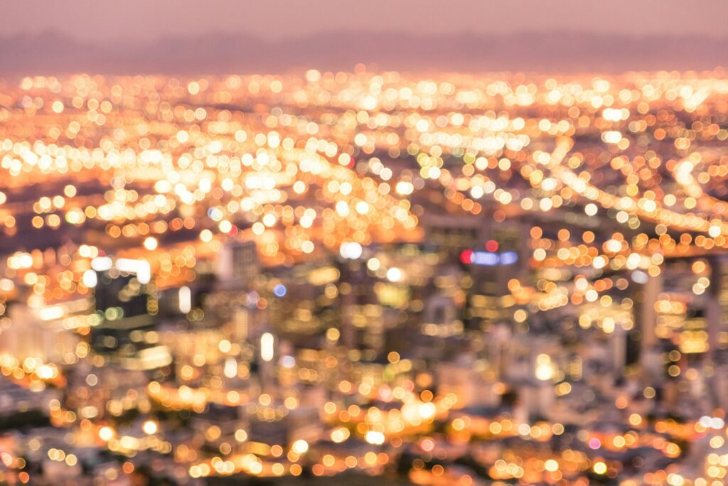 Bokeh of Cape Town skyline from Signal Hill after sunset during the blue hour