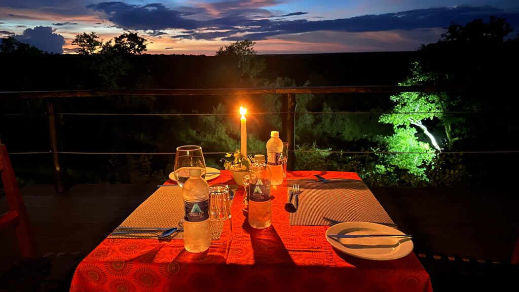 Dinner at sunset, Masuwe Lodge