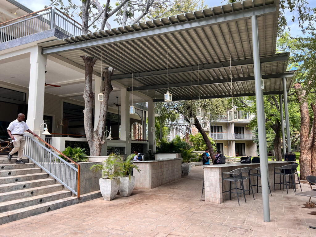 The covered dining area with cocktail bar