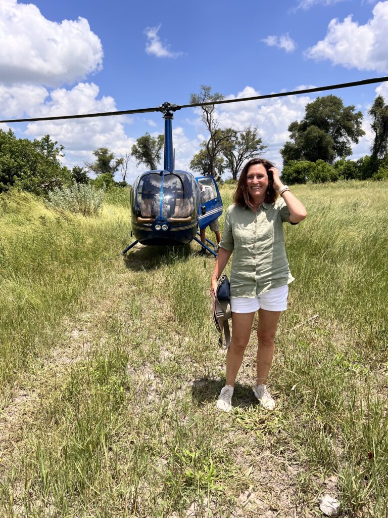 Petra with the helicopter we flew into camp with