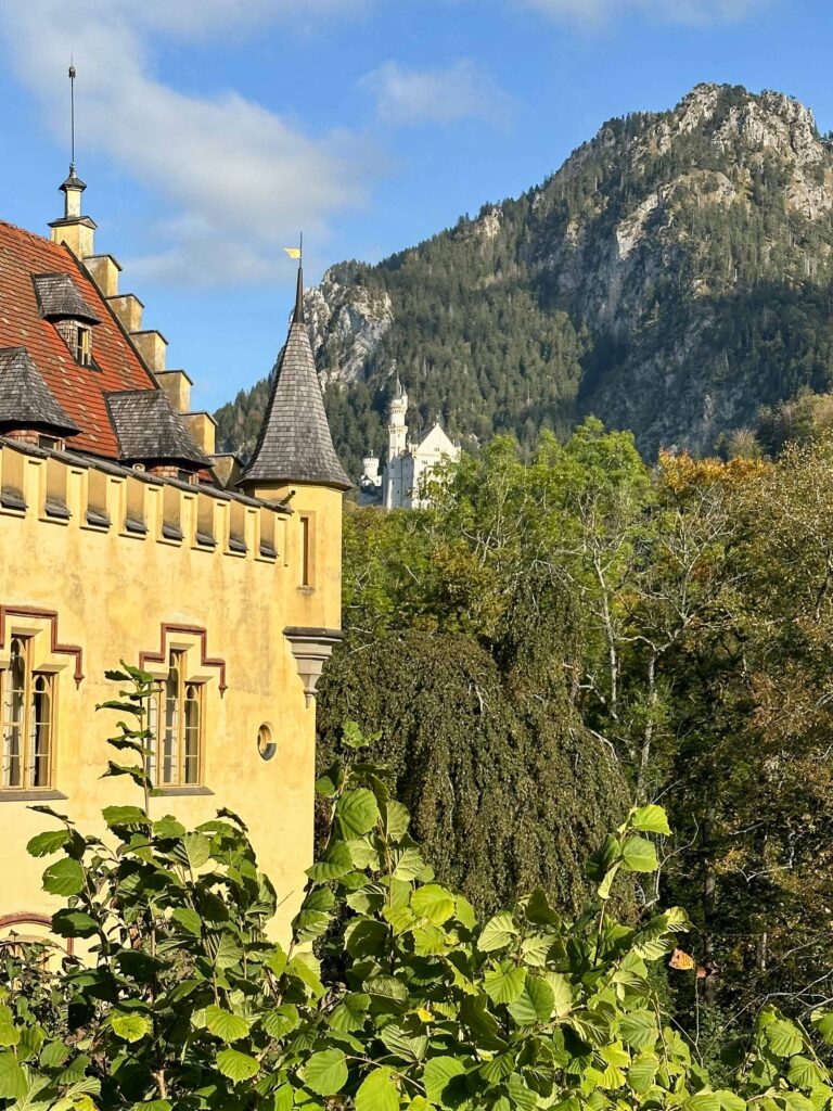 Historic Neuschwanstein Castle surrounded by alpine scenery, Germany and Switzerland Tour