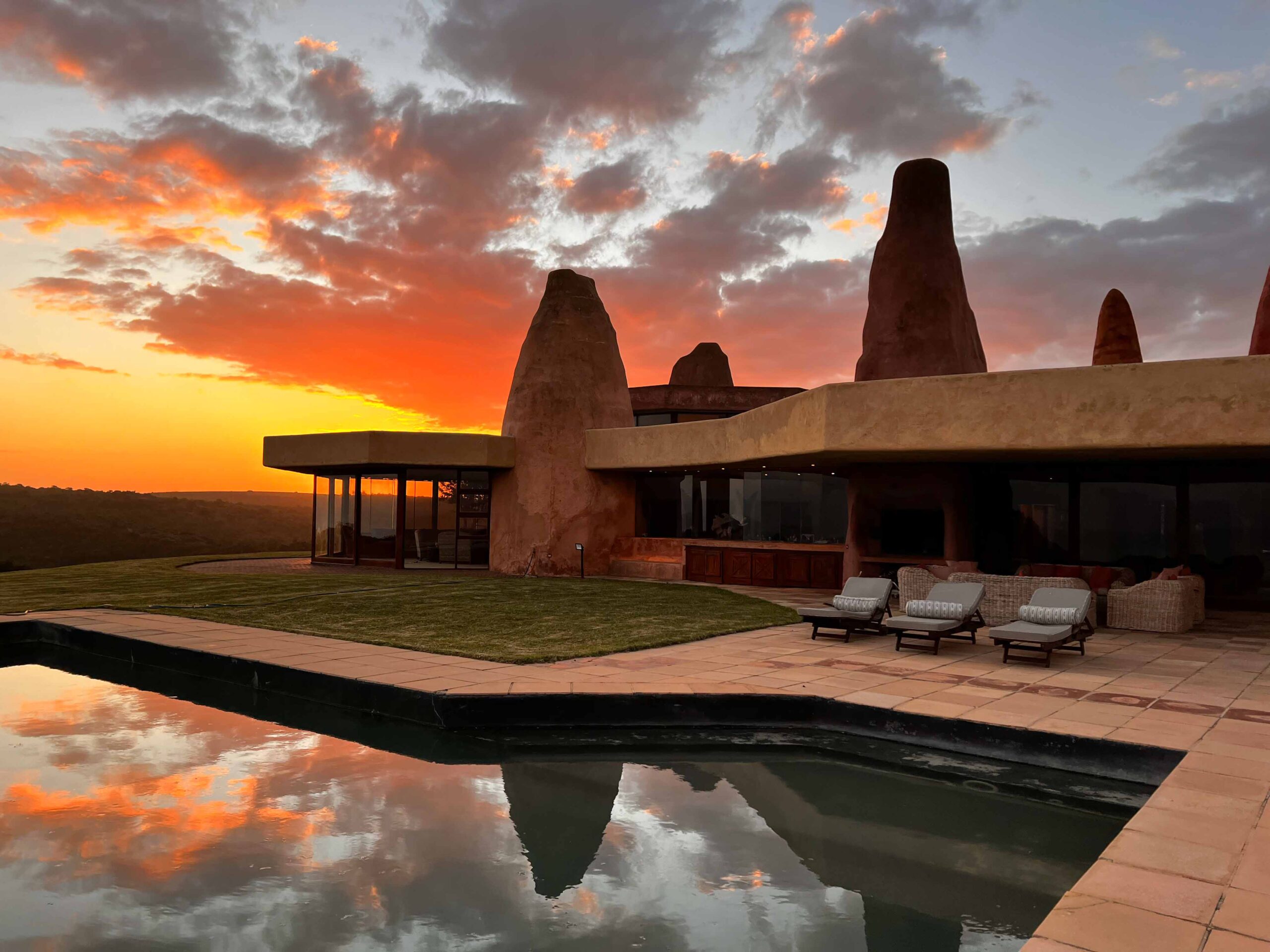 Beautiful architecture of Sandcastle Villa at sunset.